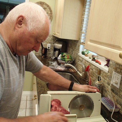 Bill, Bryan's dad, slicing up the beef roast